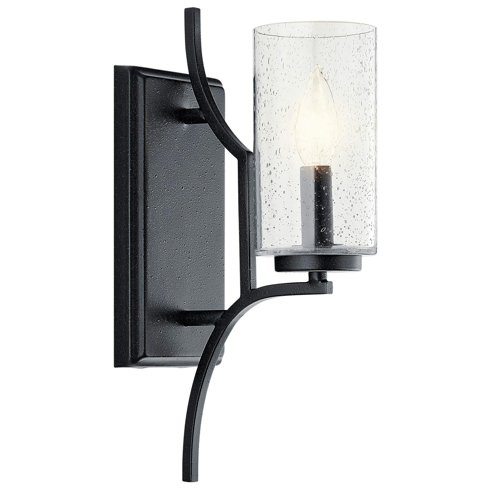 The Vara 1 Light Wall Sconce Distressed Black facing up on a white background