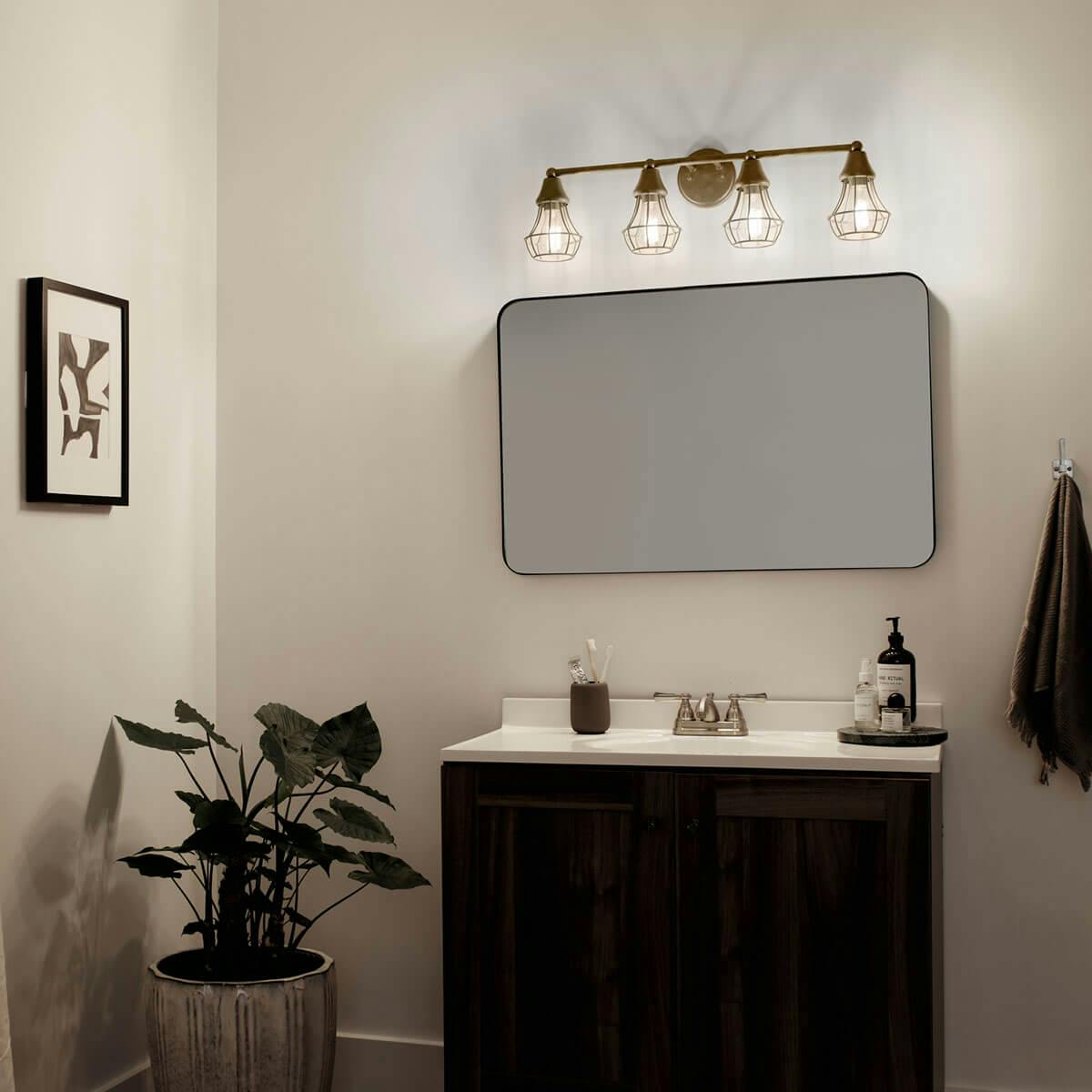 Night time Bathroom featuring Bayley vanity light 37507NBR