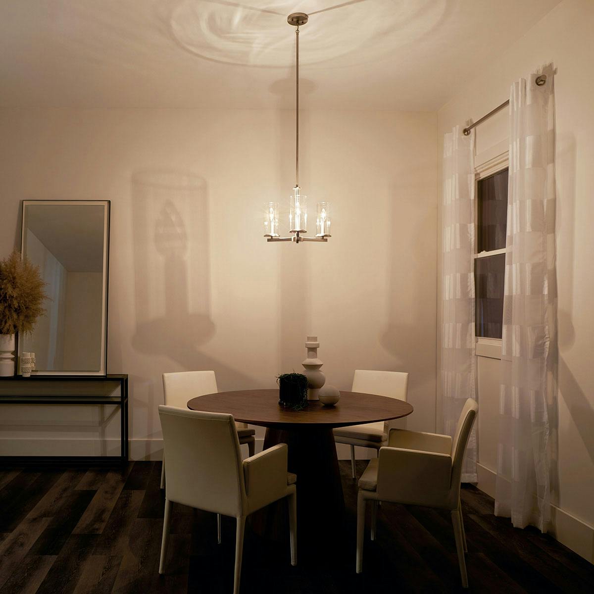 Night time dining room image featuring Crosby chandelier 43997NI