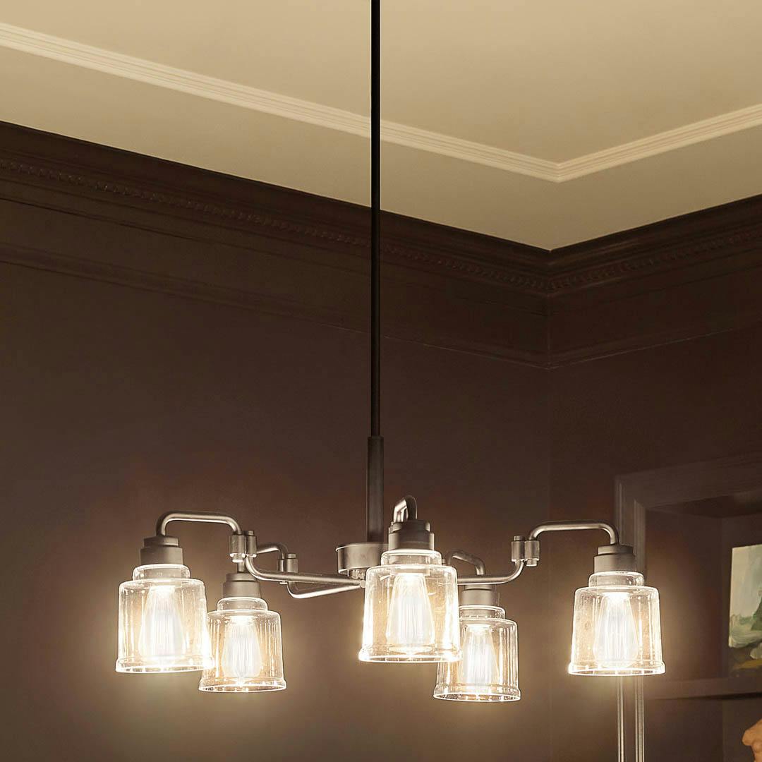 Night time dining room with Aivian™ 30" 5 Light Chandelier Black