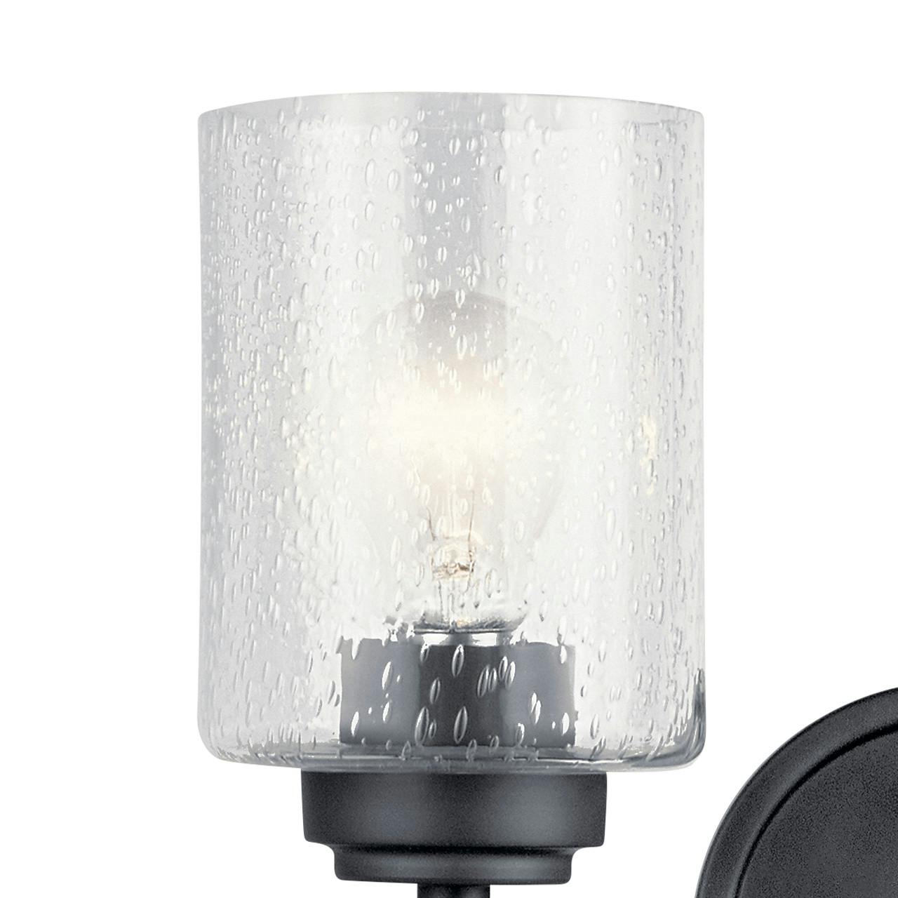 Close up view of the Winslow 2 Light Vanity Light Black on a white background