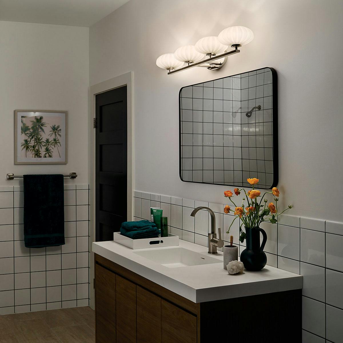 Night time Bathroom featuring Pim vanity light 55026PN