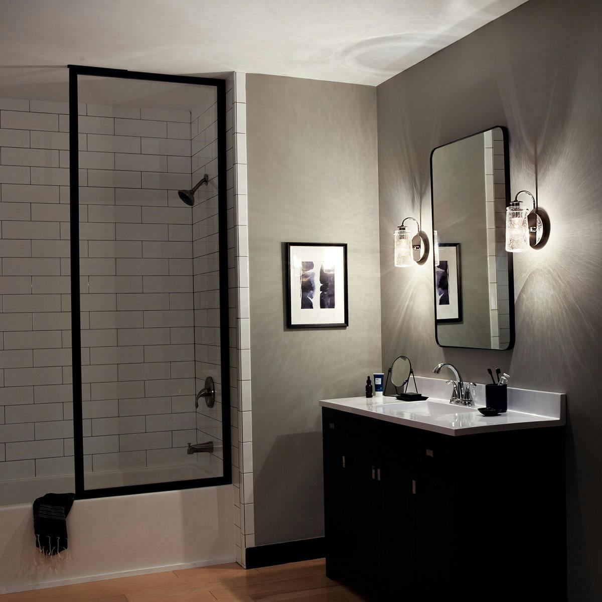 Night time Bathroom featuring Braelyn vanity light 45457CH