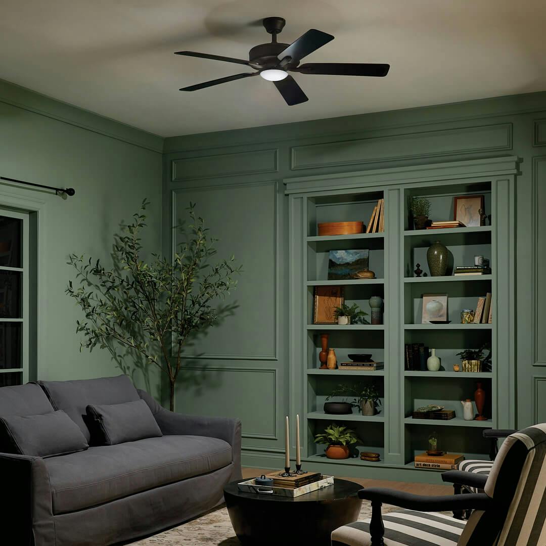 Night time living room with the 52" Basics Pro Designer Fan Satin Bronze