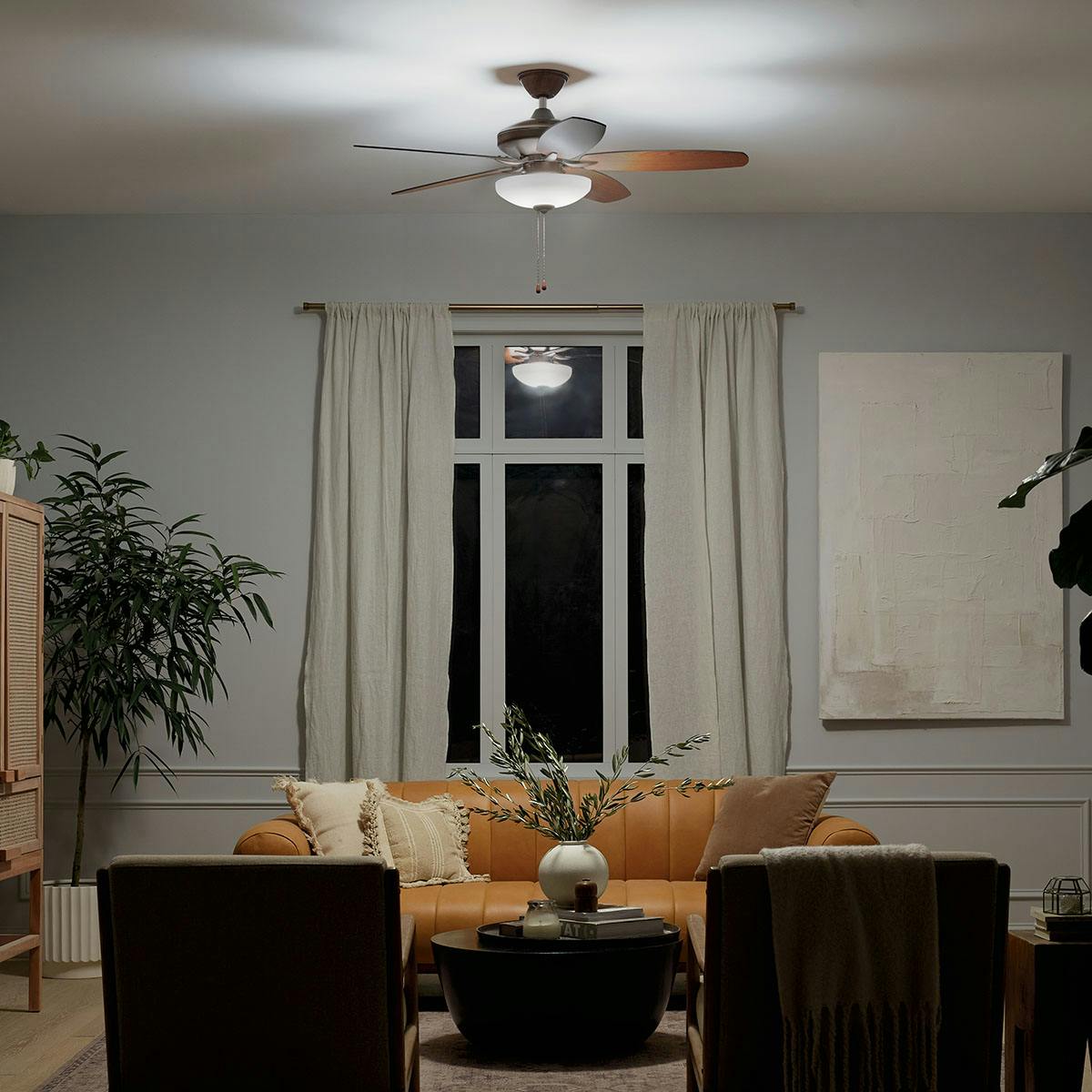 Night time living room featuring Renew ceiling fan 330161OBB
