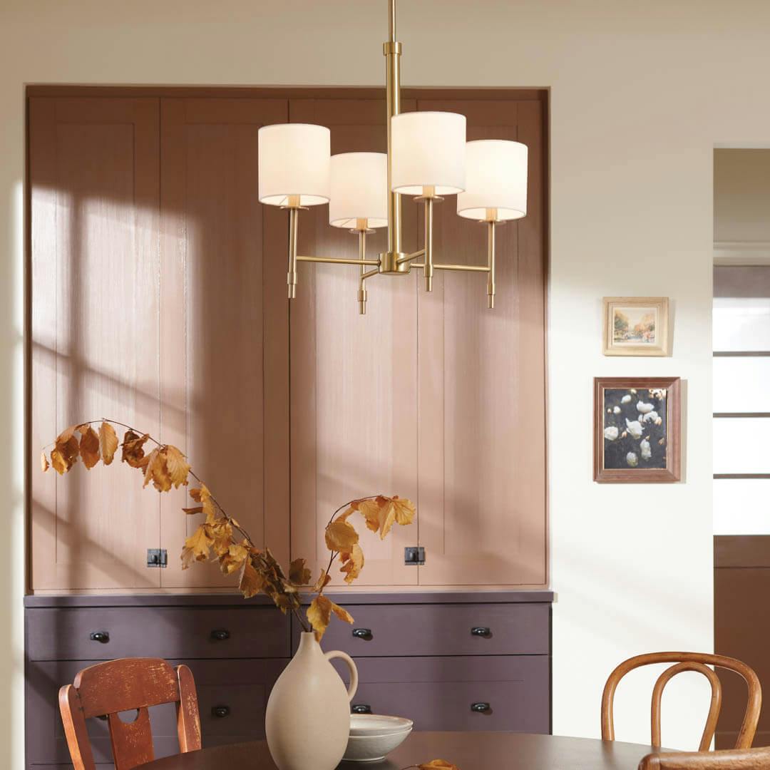 Day time dining room with Ali 20" 4 Light Chandelier Brushed Natural Brass