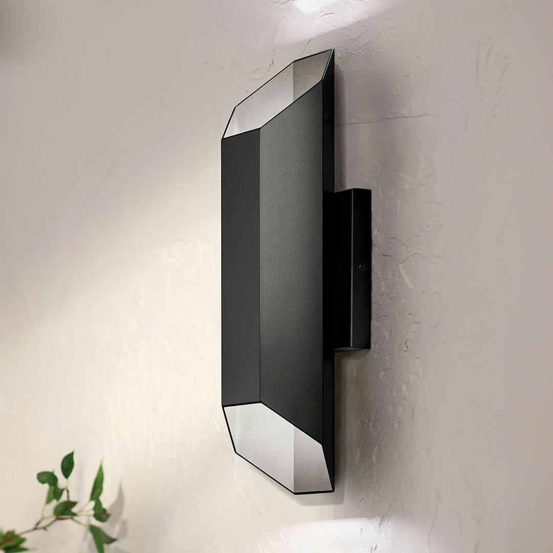 Day time view of the Estella 12" LED 1-Light Outdoor Wall Light in Black on the exterior of a home