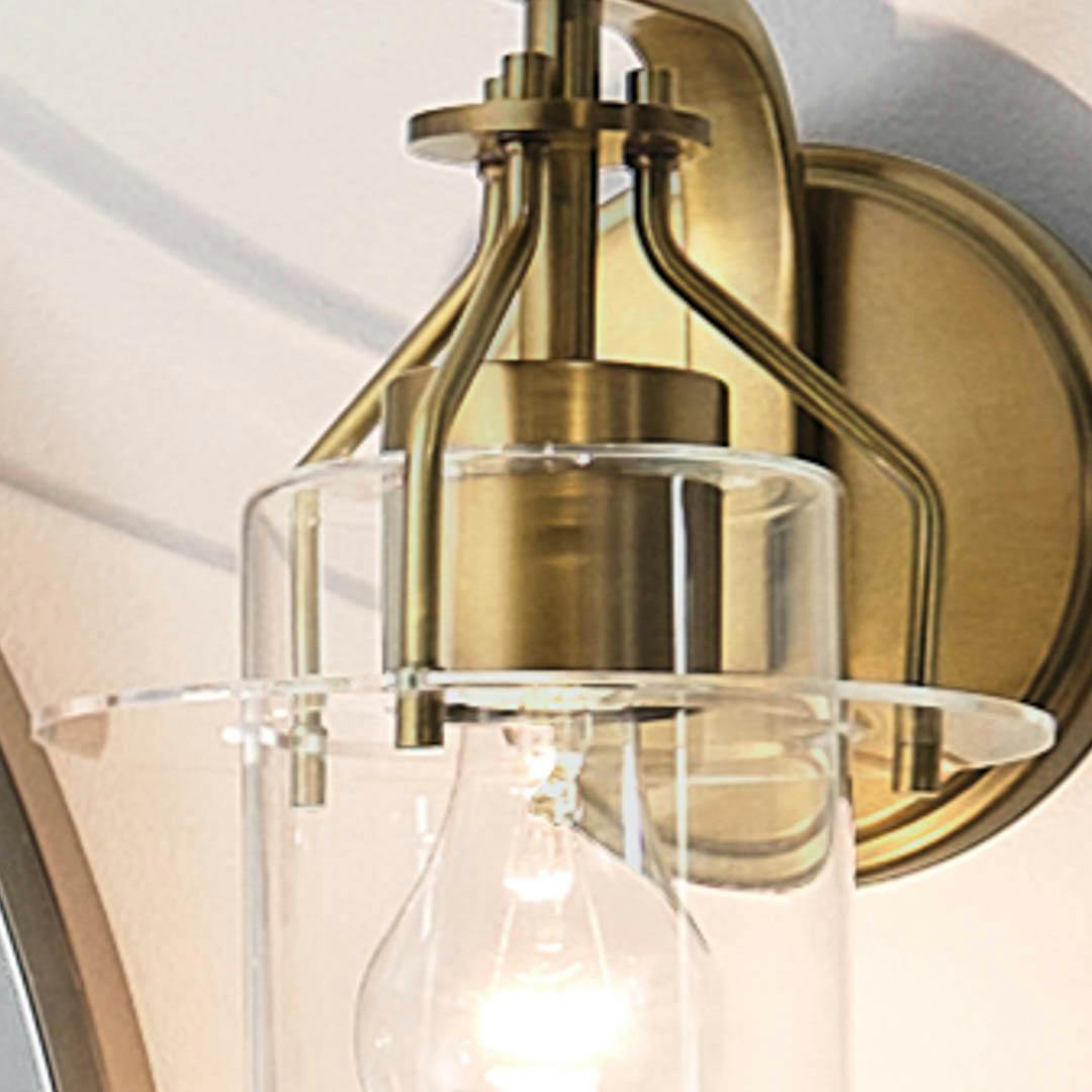 Day time bathroom with Everett 9.25 Inch 1 Light Wall Sconce with Clear Glass in Natural Brass