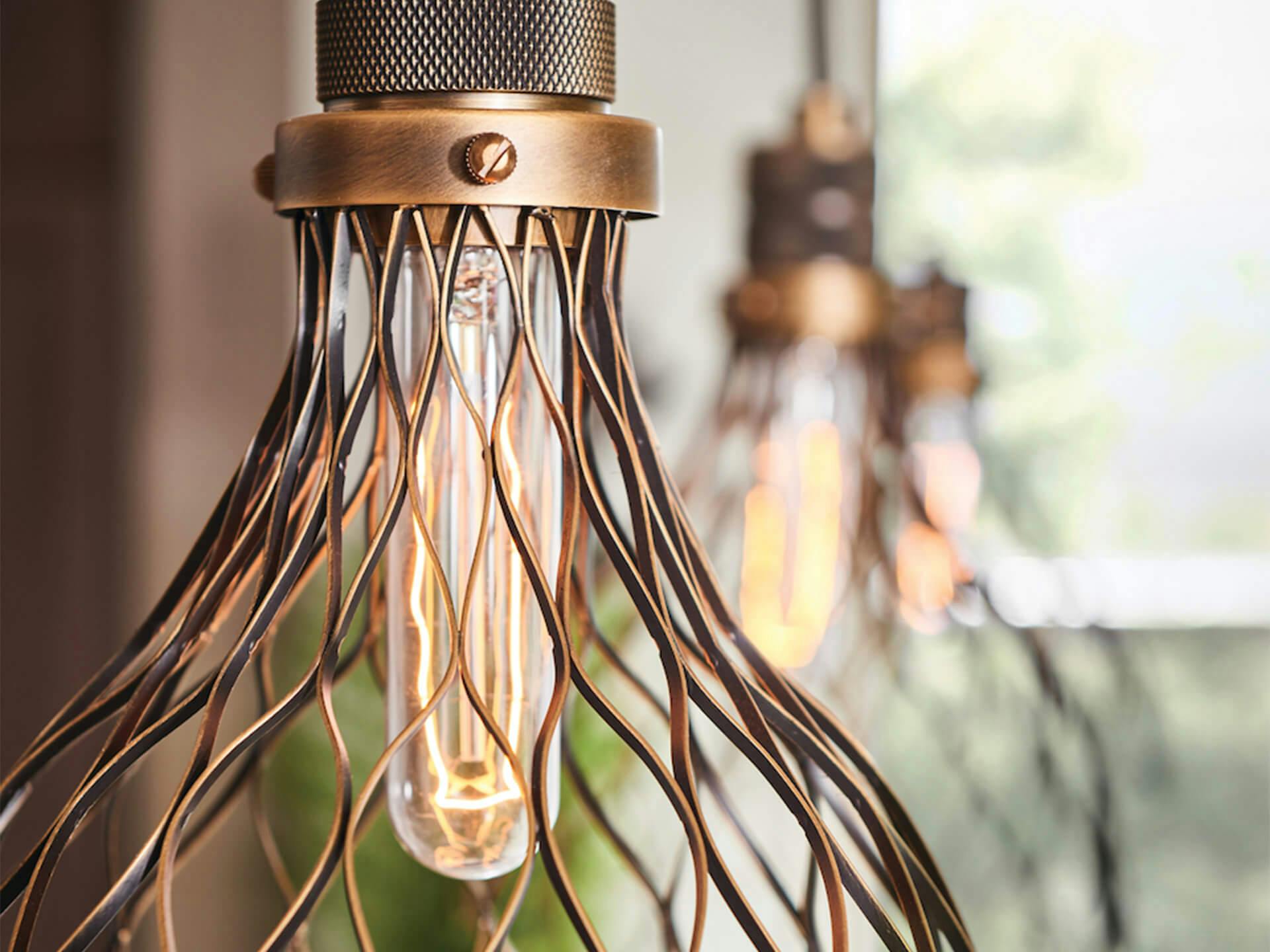 Detailed image of a Devin pendant with an exposed retro light bulb