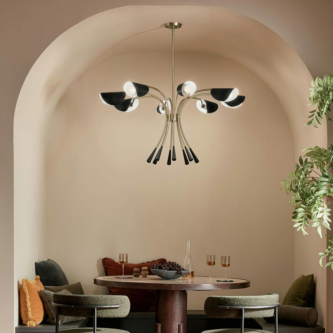 Day time dining room with the Arcus 45.5 Inch 8 Light Chandelier in Champagne Bronze with Black