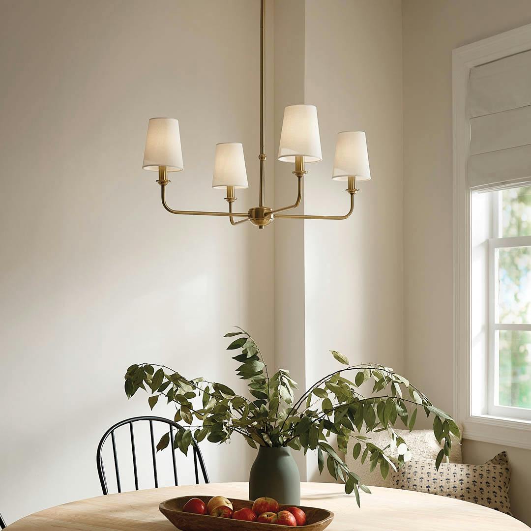 Day time breakfast nook with Pallas 25" 4 Light Chandelier Brushed Natural Brass