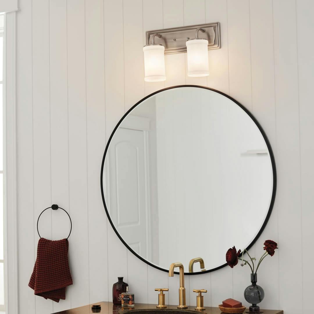Day time bathroom featuring Vetivene vanity light 55130CLP
