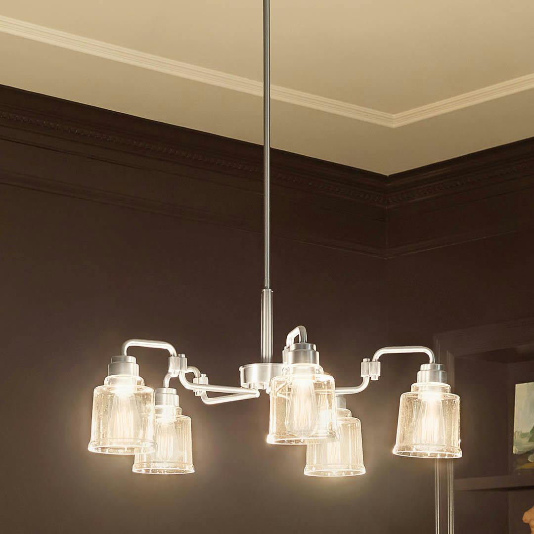 Night time dining room with Aivian™ 30" 5 Light Chandelier Brushed Nickel