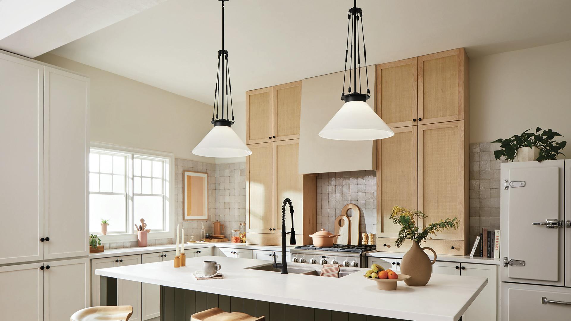 Open concept kitchen with Albers pendants hanging above a kitchen island
