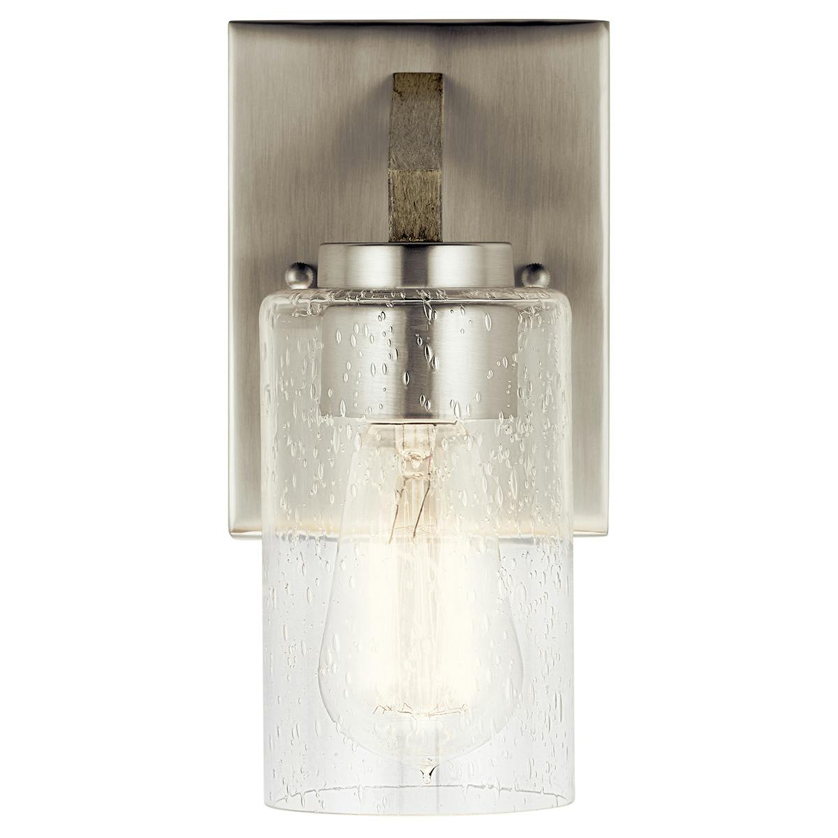 The Deryn™ 1 Light Wall Sconce Antique Grey facing down on a white background