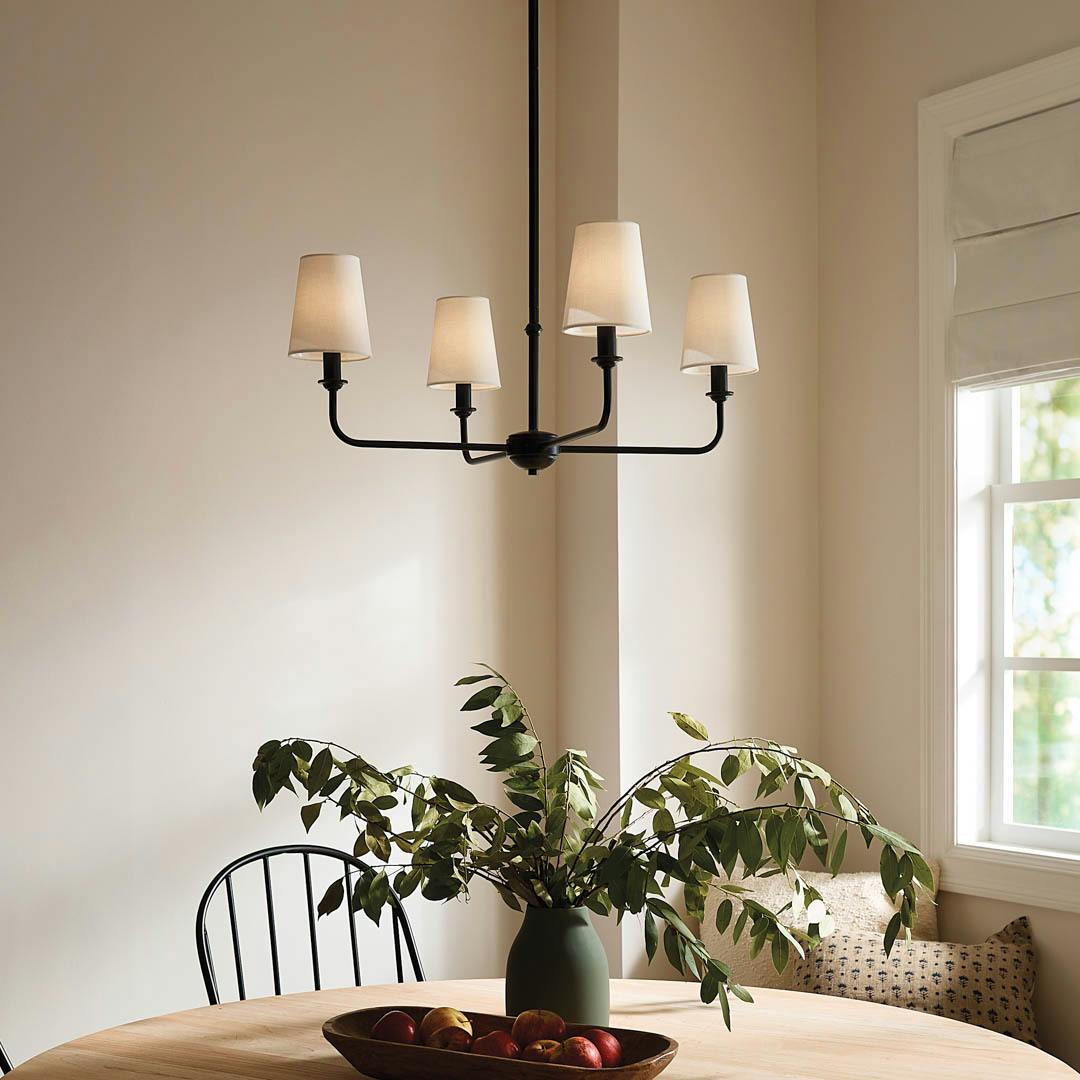 Day time breakfast nook with Pallas 25" 4 Light Chandelier Black