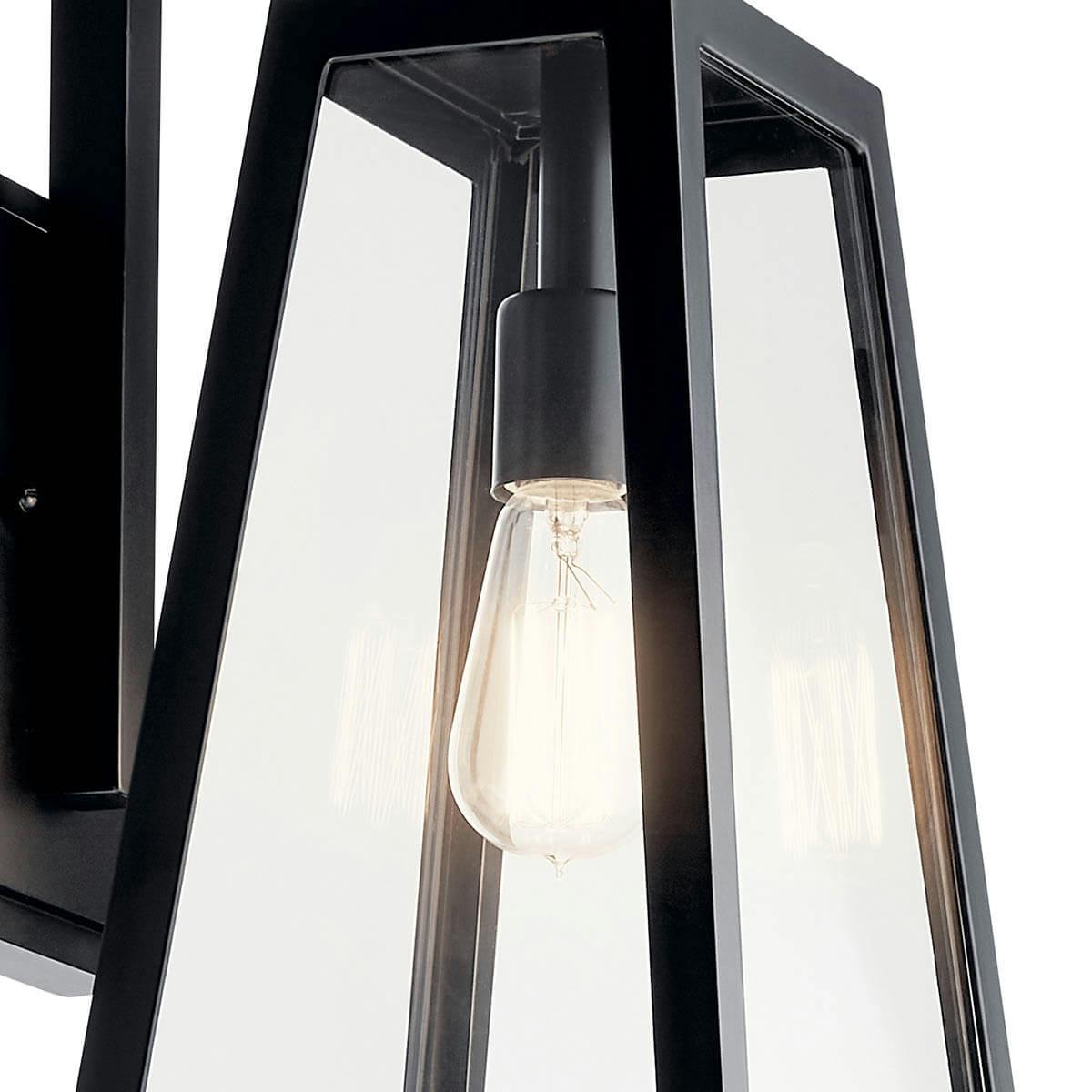 Close up of The Delison 16.75 " 1 Light Wall Light Black on a white background