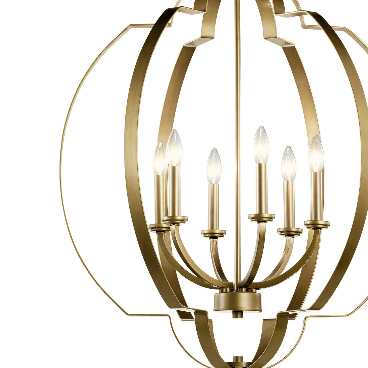 Close up view of the Voleta 6 Light Foyer Chandelier Brass on a white background