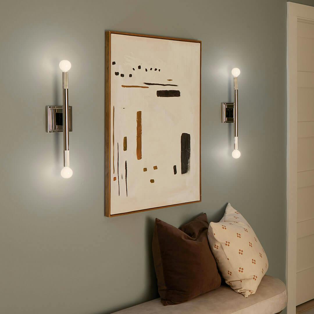 Night time mudroom with the Odensa 17 Inch 2 Light Wall Sconce in Polished Nickel