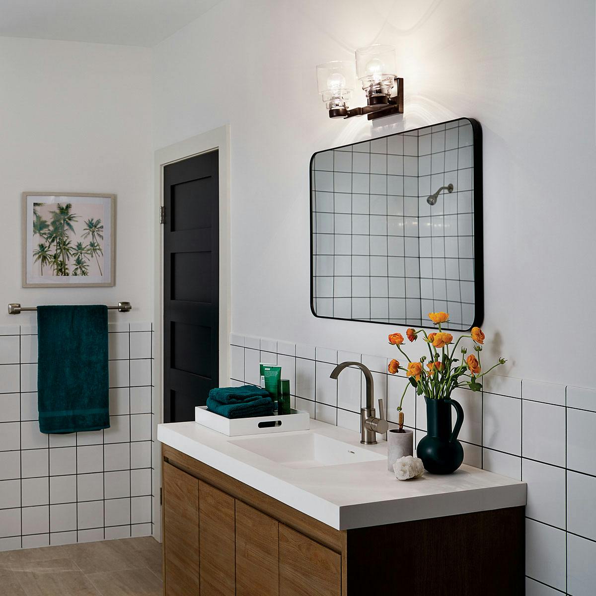 Daytime Bathroom featuring Vionnet vanity light 55011BK