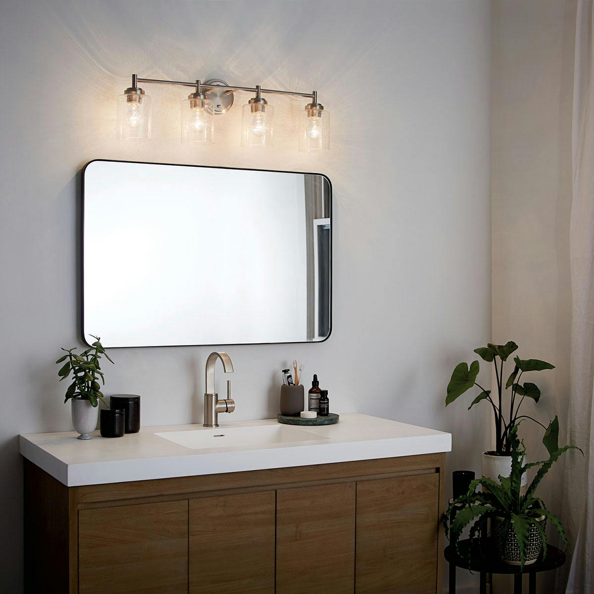 Nighttime Bathroom featuring Winslow vanity light 45887NI