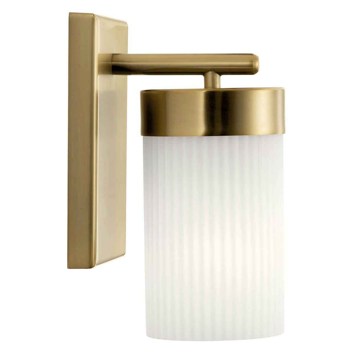 Profile view of the Ciona 9" 1 Light Sconce in Brass on a white background