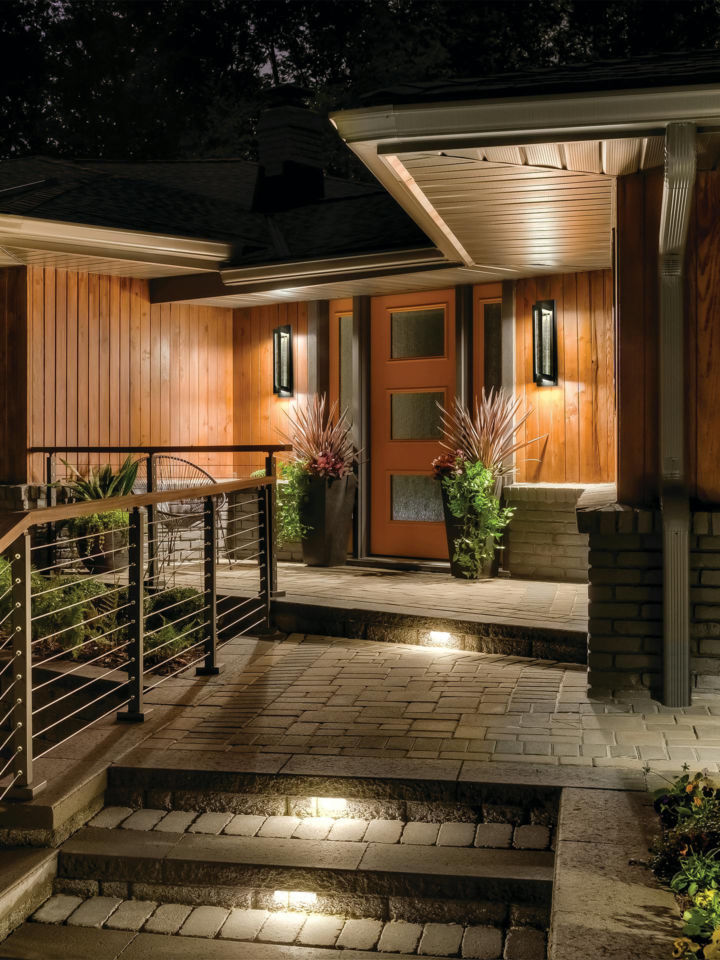 Outdoor entryway at night with River path lights