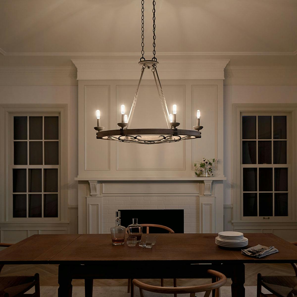 Night time dining room image featuring Taulbee chandelier 43824WZC