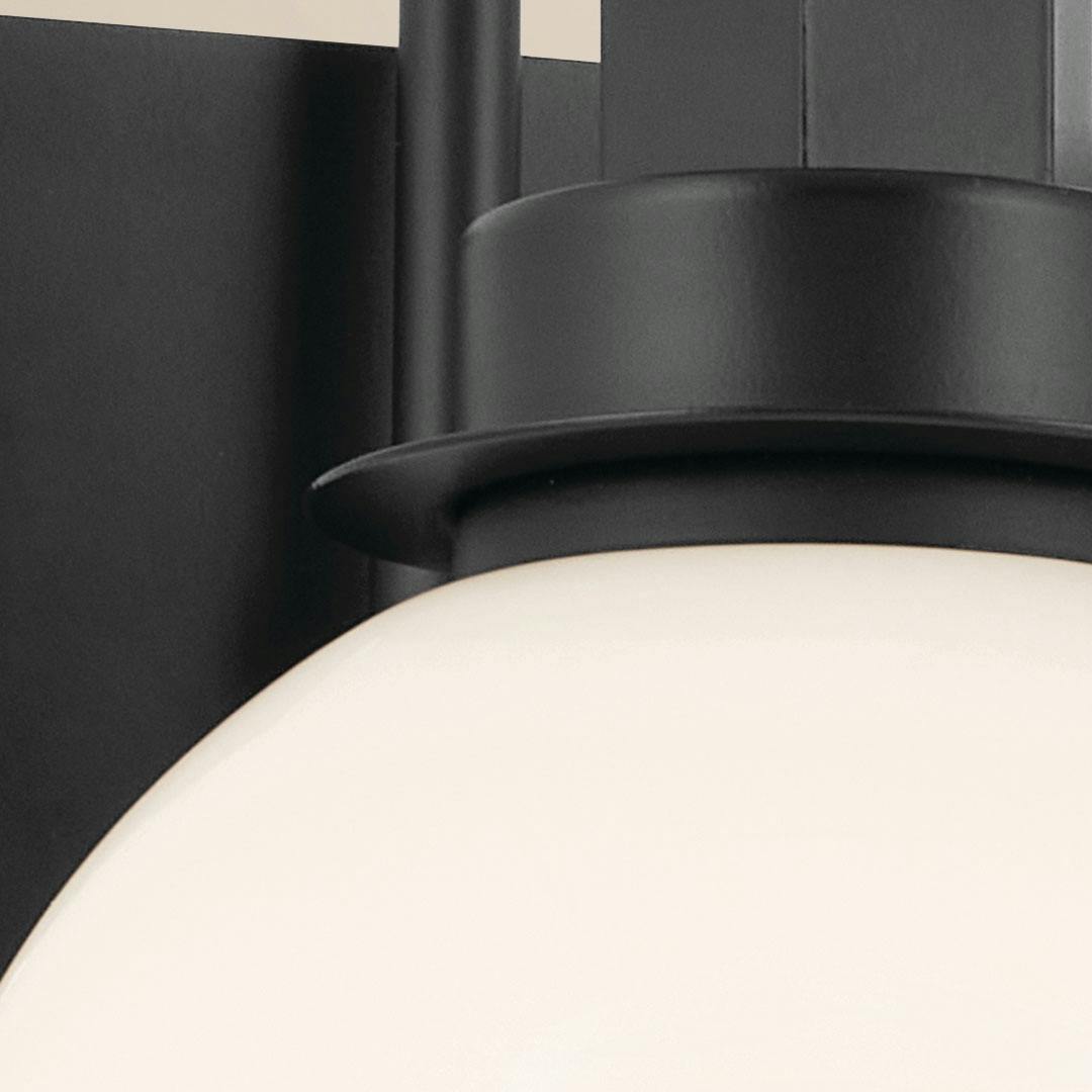 Close up view of the Hex 22.75 Inch 3 Light Vanity with Opal Glass in Black