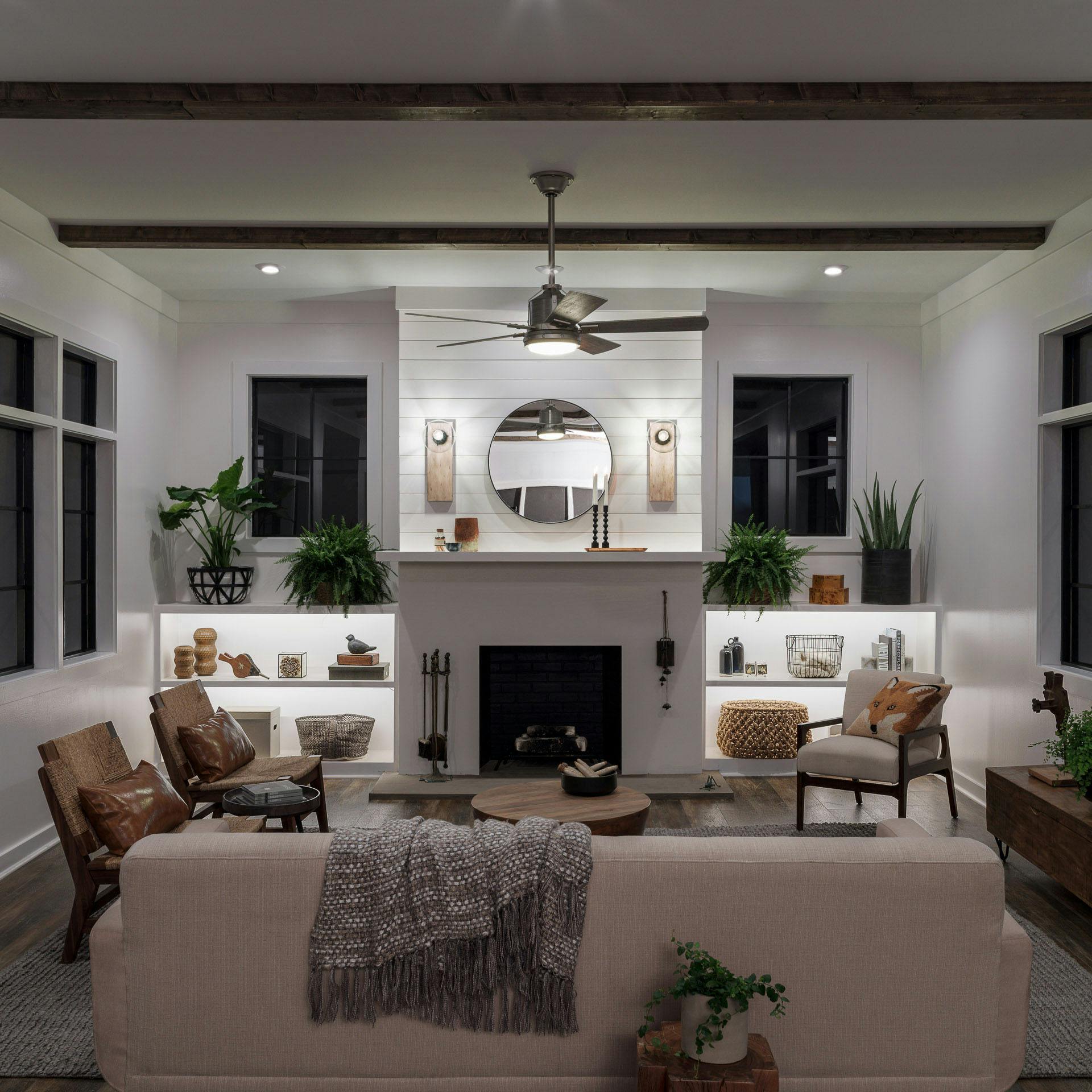 Night time Modern Farmhouse living room with all lights turned on