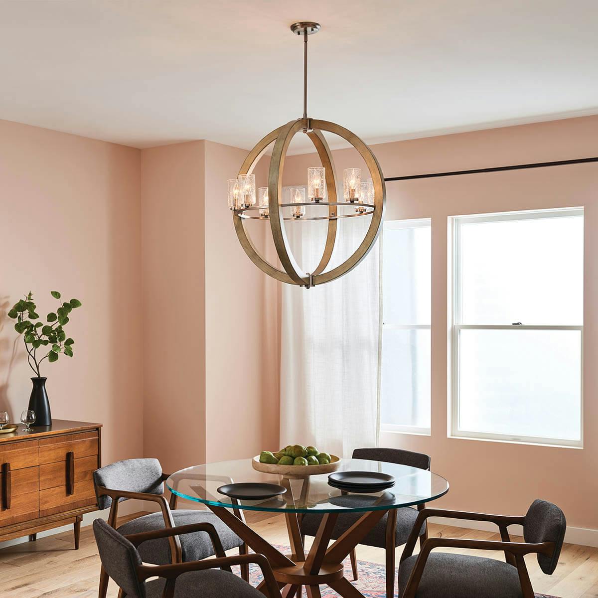 Day time dining room with Grand Bank™ 8 Light Chandelier in Distressed Antique Gray