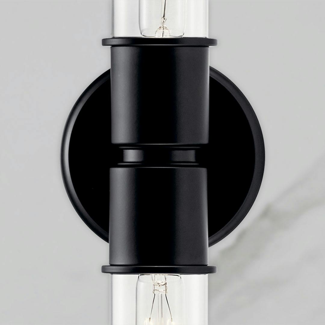 Close up view of the Aviv 24 Inch 2 Light Wall Sconce with Clear Glass in Black