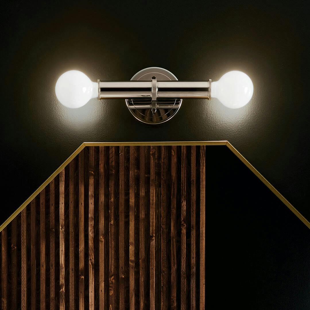 Night time bathroom with the Torche 9.75 Inch 2 Light Wall Sconce in Polished Nickel