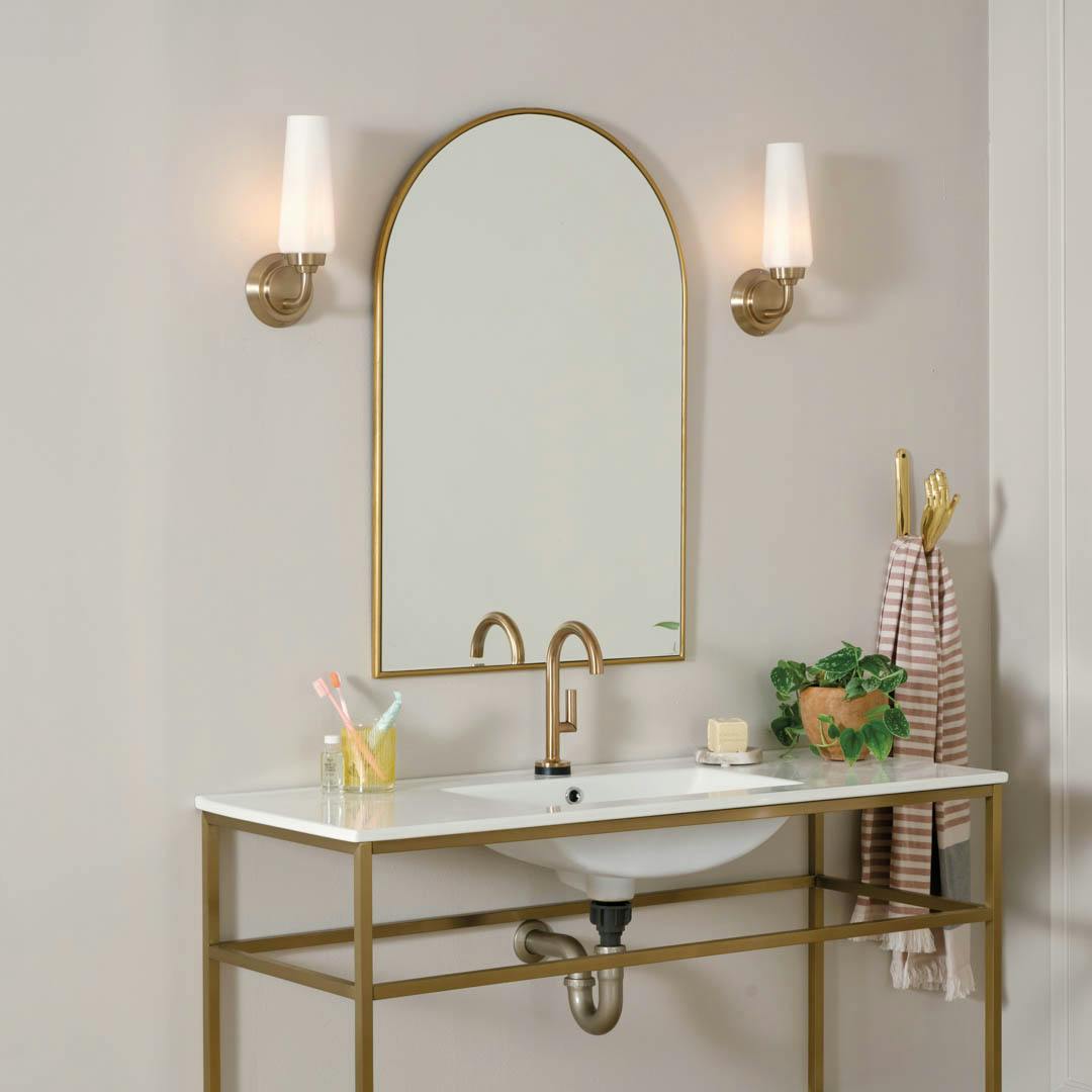Day time bathroom with Truby 11.5 Inch 1 Light Wall Sconce with Satin Etched Cased Opal Glass in Champagne Bronze