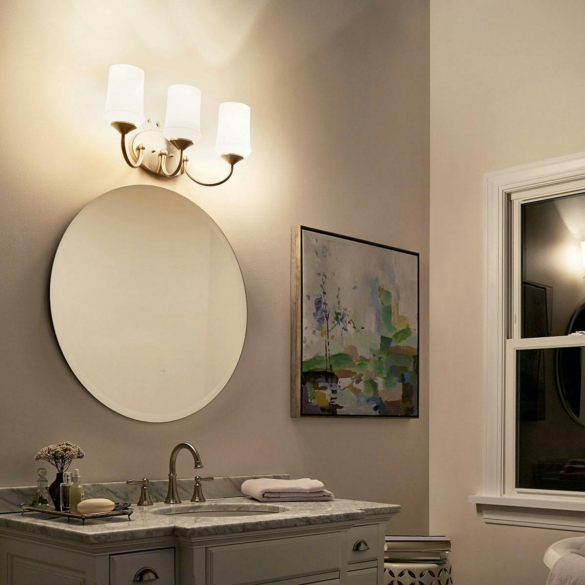 Night time Bathroom featuring Aubrey vanity light 45570NI