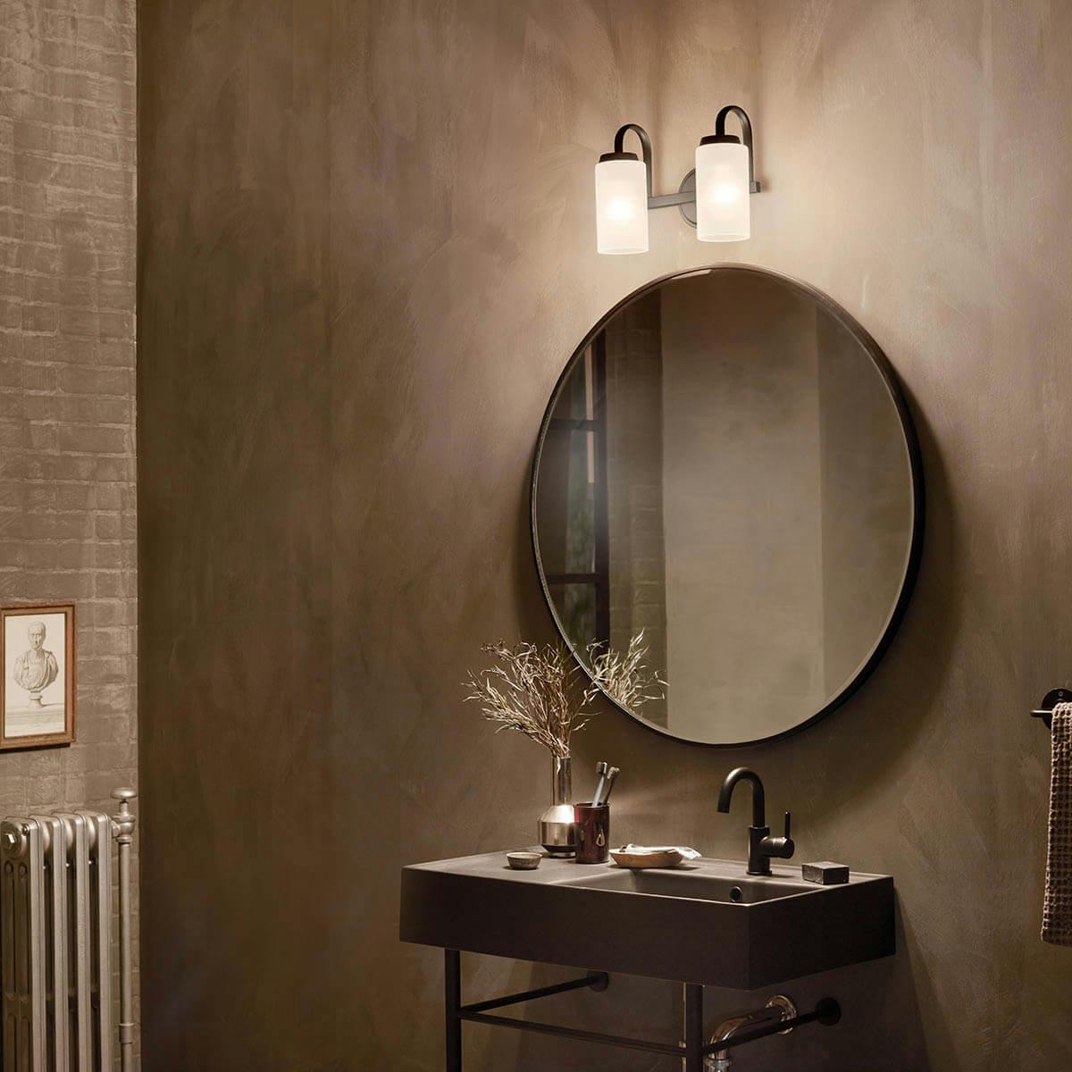 Night time bathroom with Kennewick 2 light vanity light in black