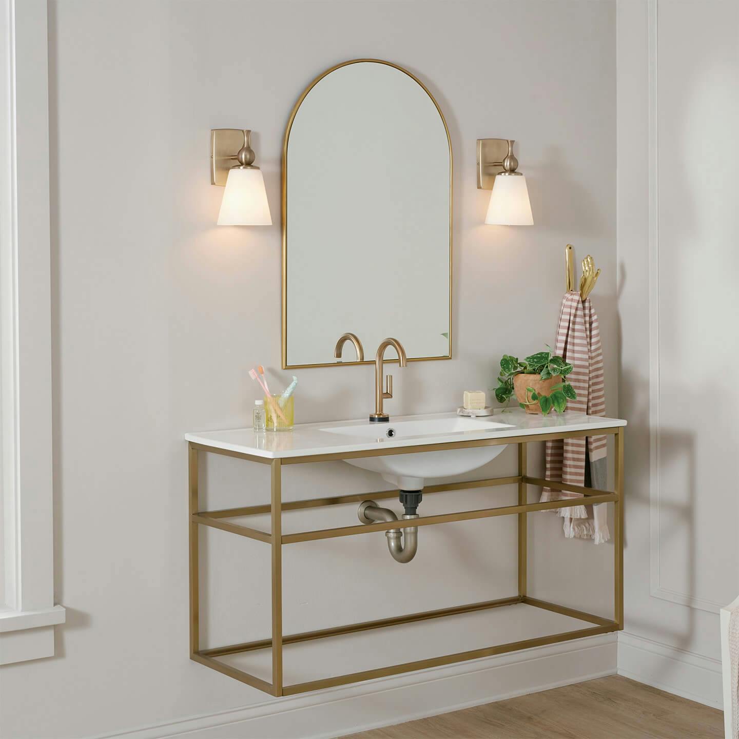Cosabella Wall Sconces mounted on both sides of a bathroom mirror