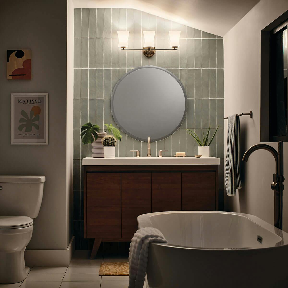 Night time bathroom image featuring Briane vanity light 55117BNB
