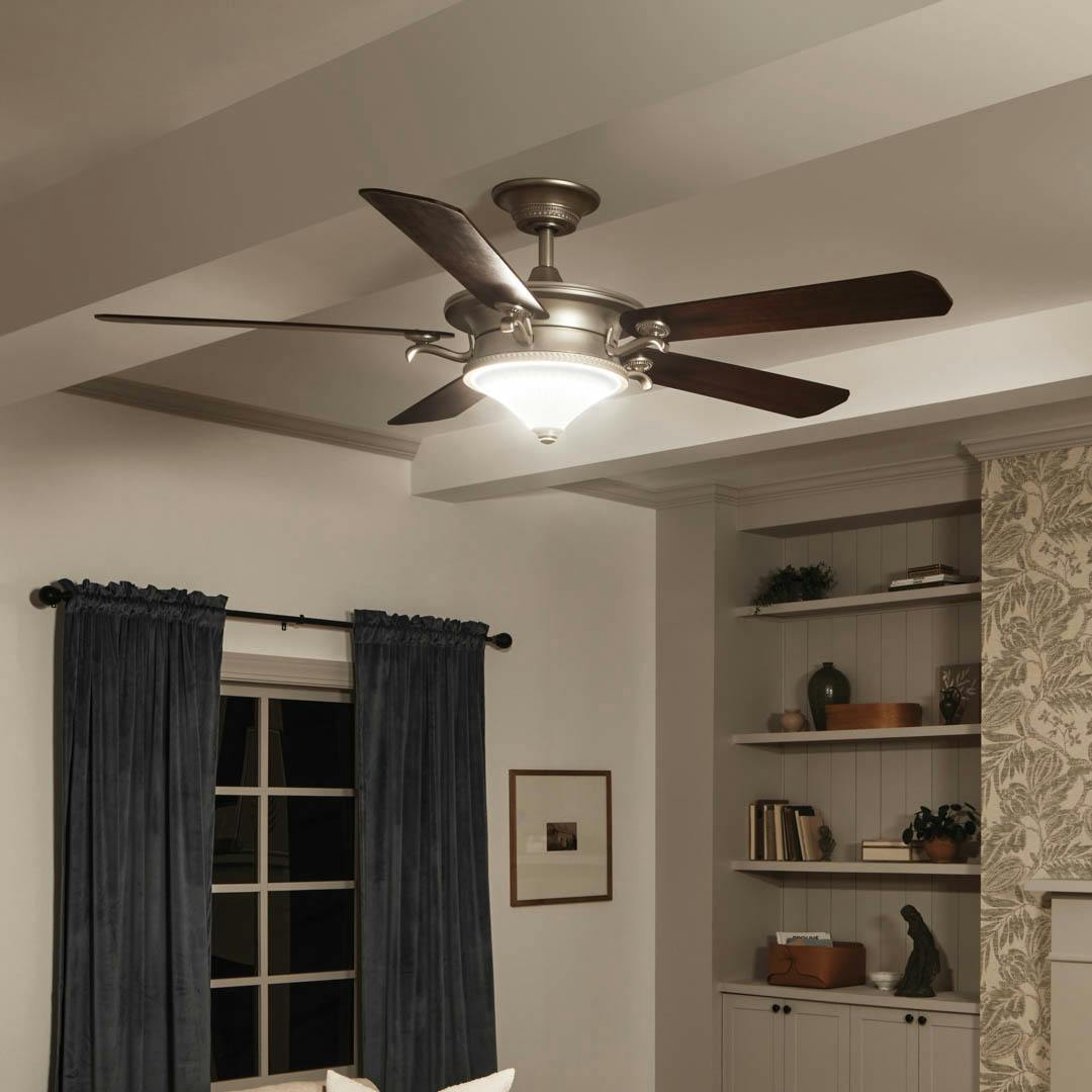 Night time living room with 60" Rise 5 Blade LED Indoor Ceiling Fan Brushed Nickel