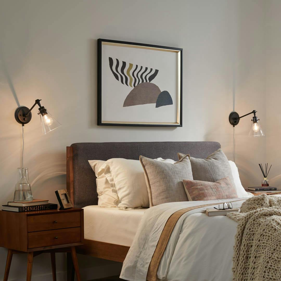 Day time bedroom with Rosewood 12 Inch 1 Light Plug-In Wall Sconce in Matte Black with Clear Glass