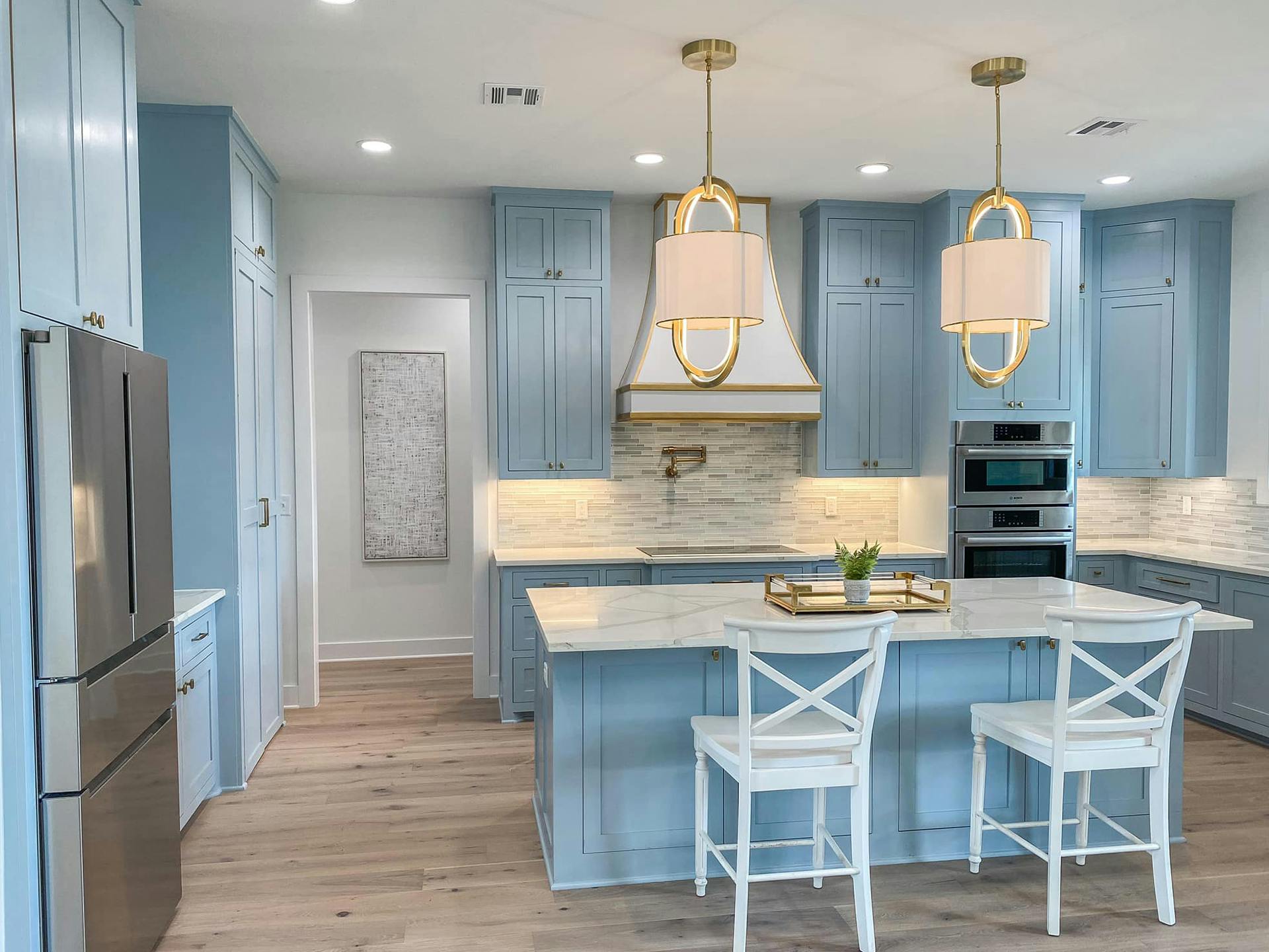 Baby Blue Kitchen with 2 Kichler pendants hanging over the island
