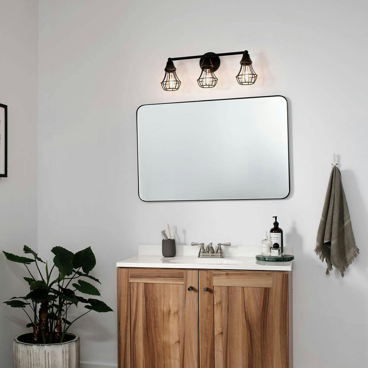 Day time Bathroom featuring Bayley vanity light 37510BK