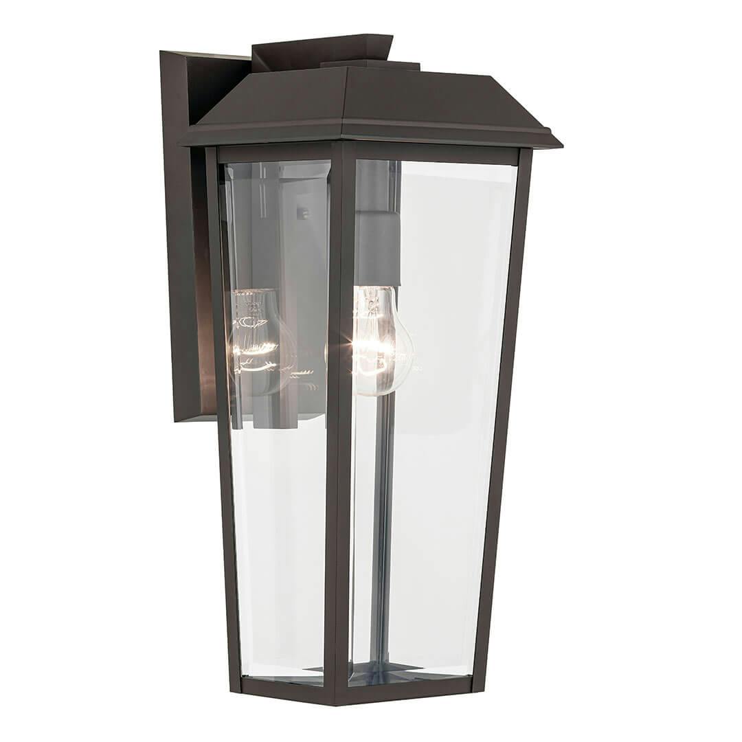 The Mathus 18" 1 Light Outdoor Wall Light with Clear Glass in Olde Bronze on a white background