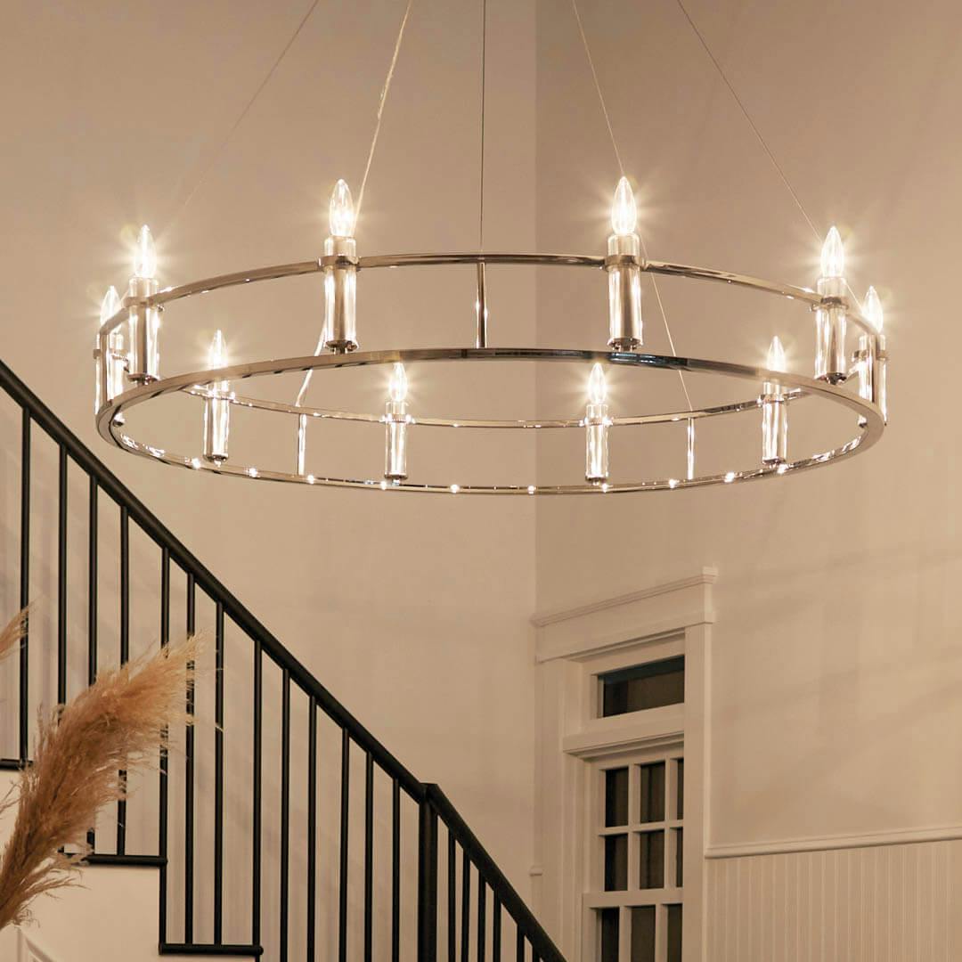 Night time foyer with Rosalind 50" 10 Light Chandelier Polished Nickel