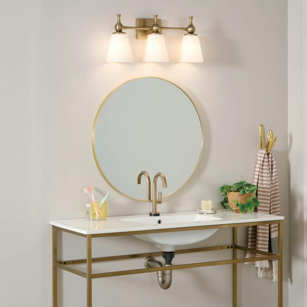 Day time bathroom with Cosabella™ 24" 3 Light Vanity Light Champagne Bronze