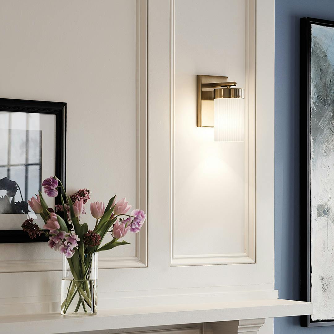 Day time Dining Room with Ciona™ 9" 1 Light Wall Sconce with Round Ribbed Glass Brushed Natural Brass