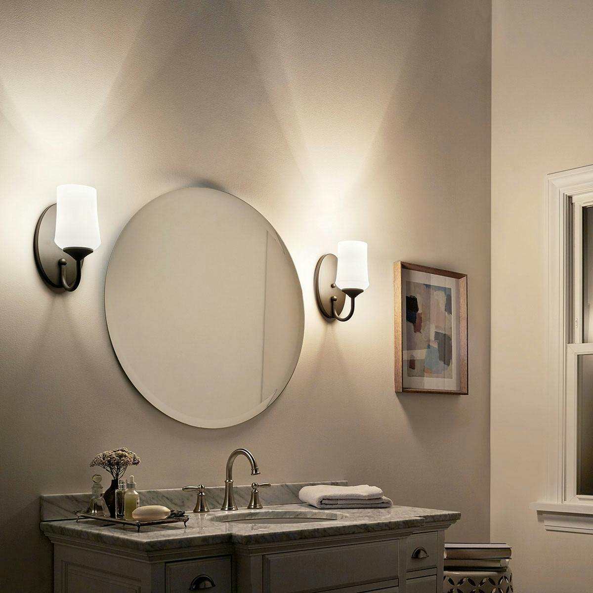 Night time Bathroom featuring Aubrey vanity light 45568OZ