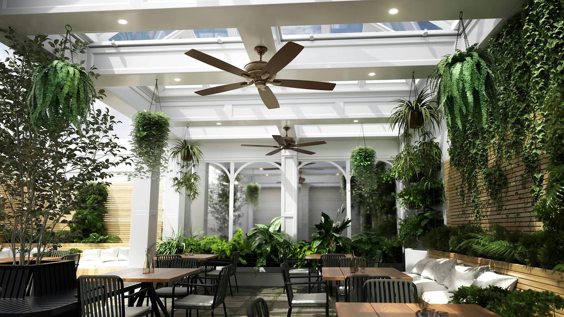 Partially outdoor restaurant with glass ceiling and greenery hanging from the walls, featuring ceiling lights and fans
