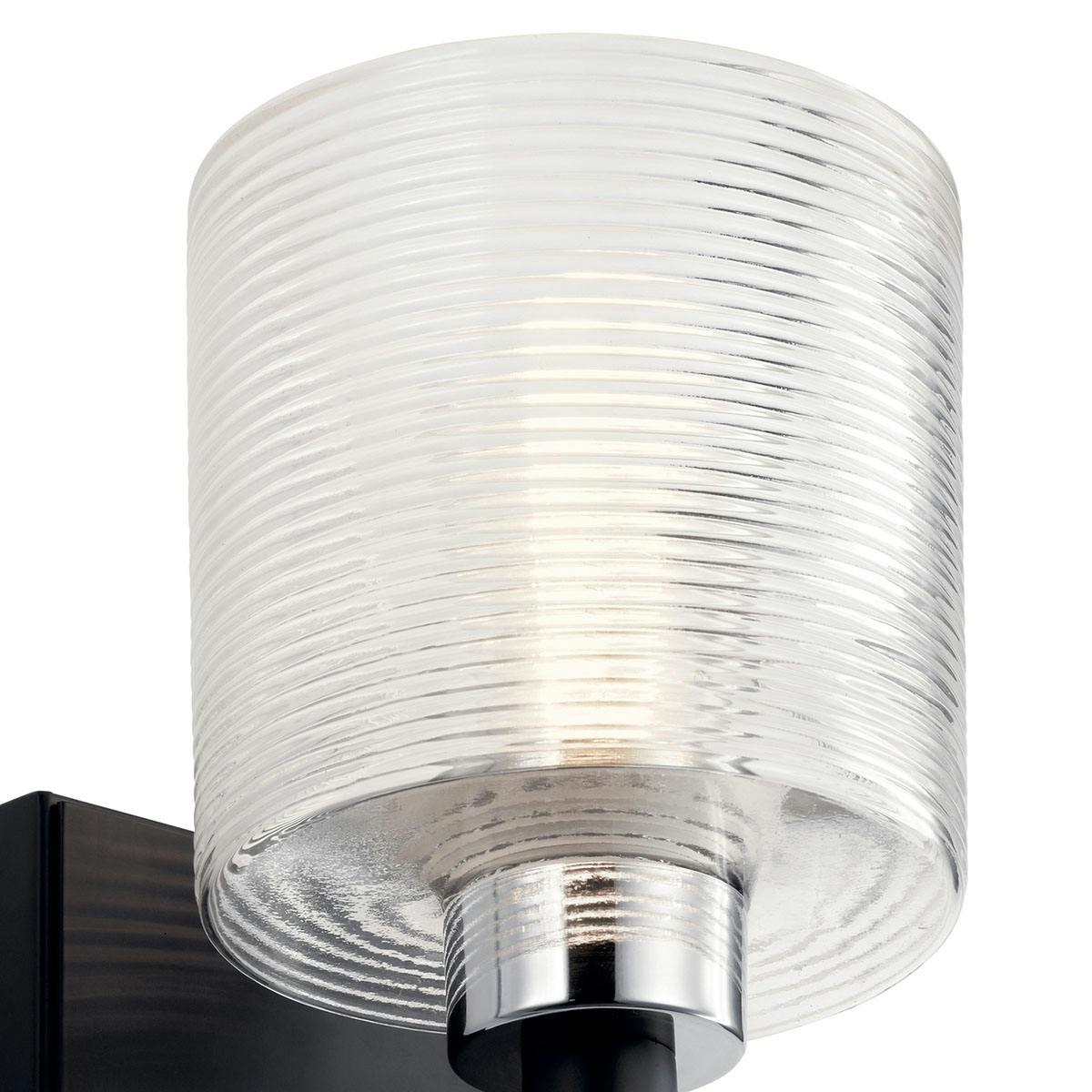 Close up view of the Harvan 9.25" 1 Light Sconce Black on a white background