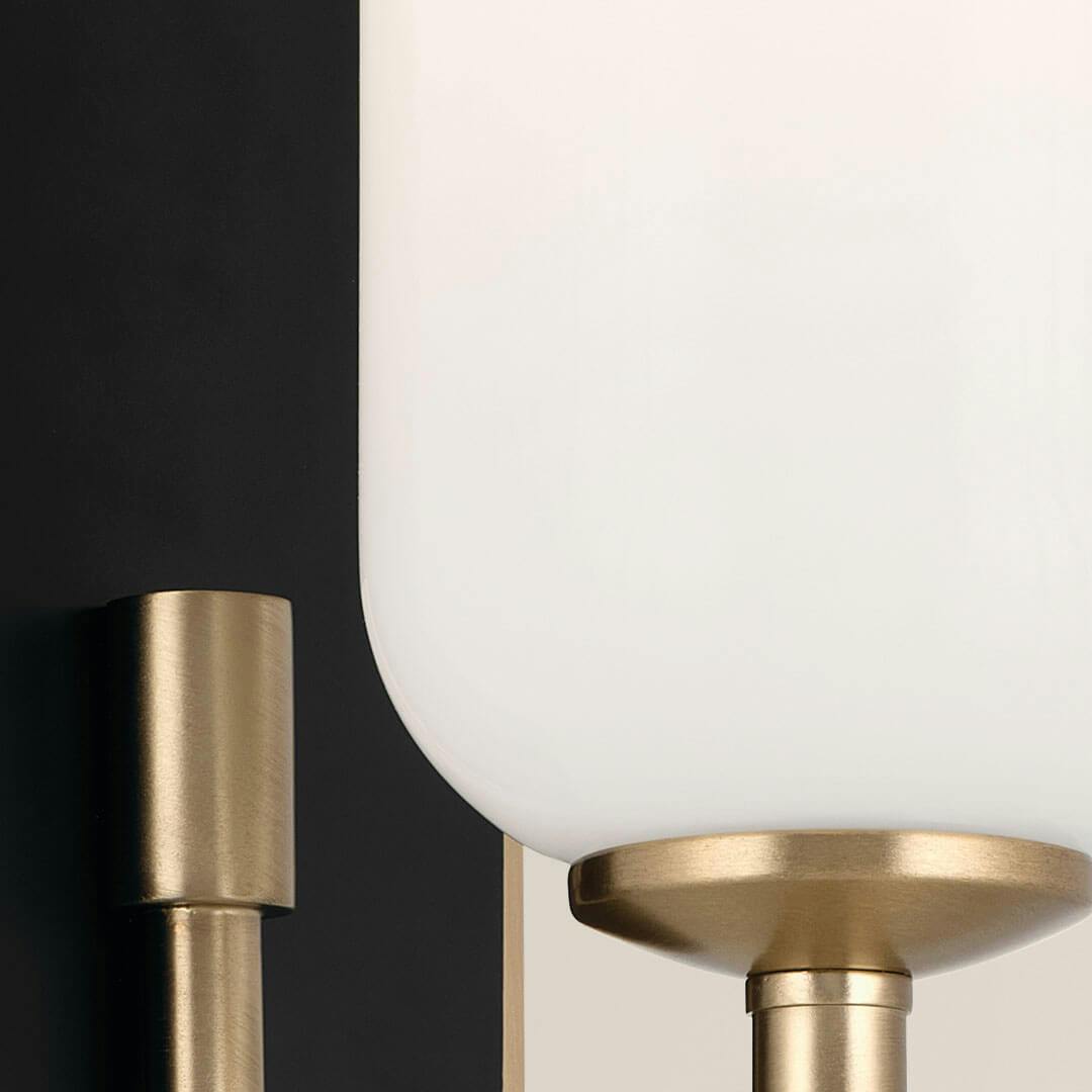 Close up of the Solia 13.5 Inch 1 Light Wall Sconce with Opal Glass in Champagne Bronze with Black
